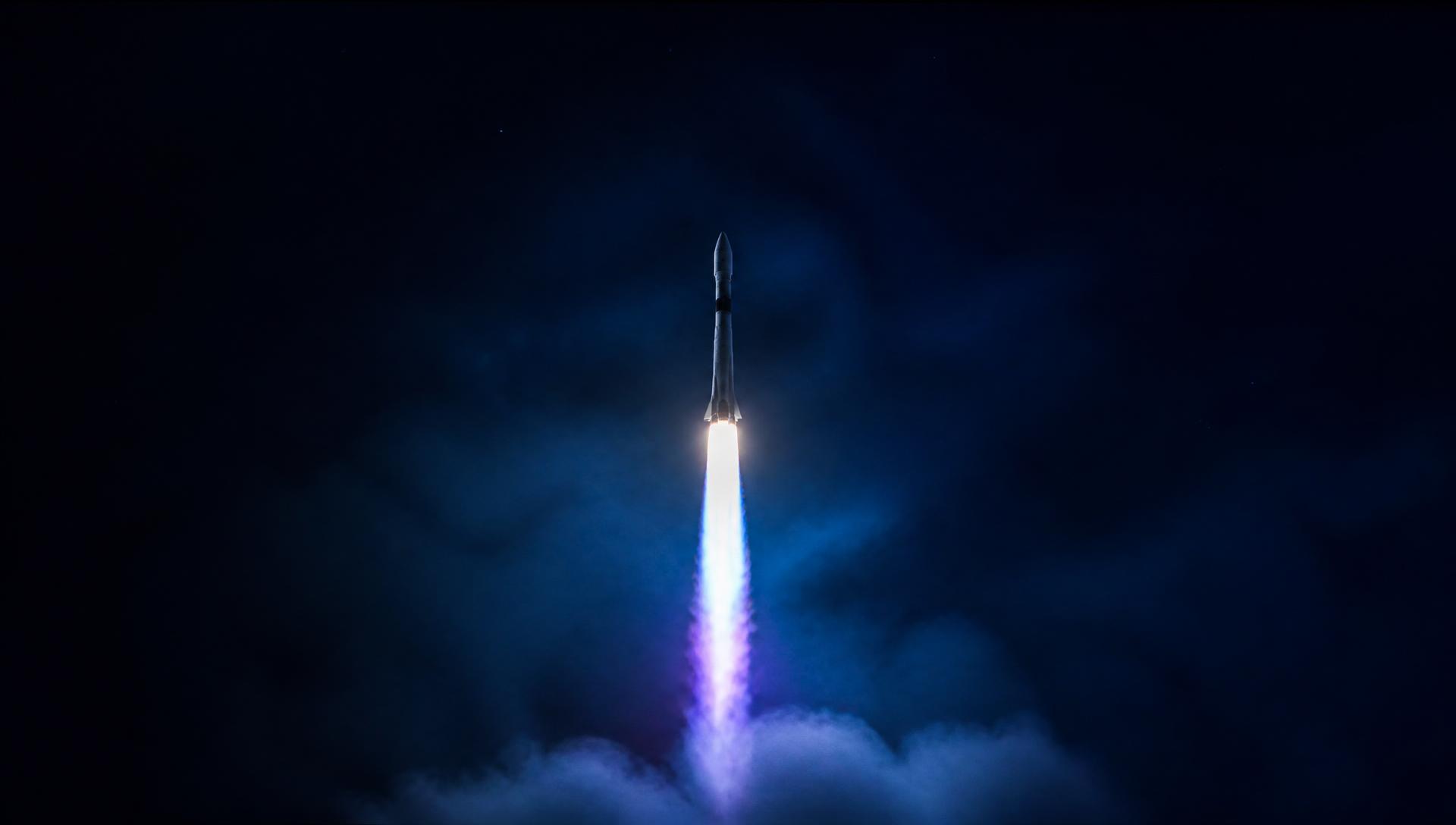 A rocket climbing through the night sky with a violet exhaust plume